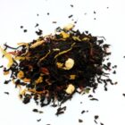 Mélange de thé noir avec morceaux d'orange, chocolat, calendula et fleurs de carthame